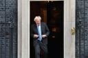 Prime Minister Boris Johnson exits 10 Downing Street, London, to welcome Australian Prime Minister Scott Morrison ahead of a meeting with to formally announce a trade deal with the UK. It will be the UK's first trade deal negotiated fully since