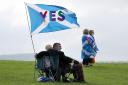 People take part in the All Under One Banner Scottish independence demonstration at the Robert the Bruce statue at the Battle of Bannockburn site near Stirling. PA Photo.