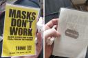 The woman was injured taking down anti-mask posters in Cardiff that had razors glued to the back of them