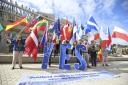Members of Yes for EU take part in the 'Believe in Scotland Day of Action' at the Scottish parliament. Photo: Gordon Terris