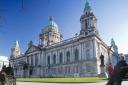 The row surrounds plans to light up Belfast City Hall