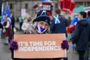 Demonstrators from pro-independence organisation All Under One Banner assemble in George Square, Glasgow, to take part in an 'emergency demonstration' against the Prime Minister, calling for the 'end of Tory rule' and 'independence now'