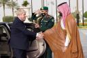 Prime Minister Boris Johnson is welcomed by Mohammed bin Salman Crown Prince of Saudi Arabia ahead of a meeting at the Royal Court in Riyadh, Saudia Arabia.