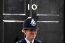 A police officer outside Number 10