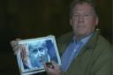 Adam Holloway held up images during a BBC Newsnight interview in an effort to prove his point