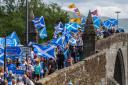 The All Under One Banner group marched for independence across Stirling Old Bridge