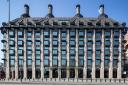 Glass-fronted Portcullis House in London is set to be too hot for certain government workers as a heatwave approaches