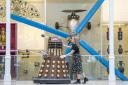 Liv Mullen with a Dalek during a photocall at the National Museum of Scotland in Edinburgh for the announcement of the forthcoming Doctor Who Worlds of Wonder exhibition