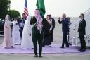 President Joe Biden arrives at King Abdulaziz International Airport, Friday, July 15, 2022, in Jeddah, Saudi Arabia. (AP Photo/Evan Vucci).