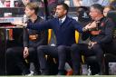 Giovanni van Bronckhorst shows his frustration in the Rangers dugout earlier this season