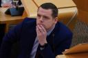 Douglas Ross was criticised after the Scottish Conservatives hailed the GERS figures. Photo: PA
