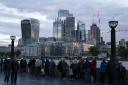 Members of the public in the queue early on Friday morning on The Queen's Walk opposite the City of London. Photograph: PA