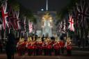 Ceremonial troops march from Buckingham Palace to the Palace of Westminster during a rehearsal