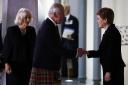 King Charles III and the Queen Consort with First Minister Nicola Sturgeon