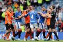 Rangers and Dundee United players square up to each other at Ibrox