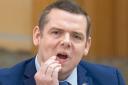 Douglas Ross called for the Scottish Government to mirror tax cuts for the rich, a policy the UK Government has since U-turned on
