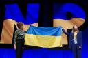 Nicola Sturgeon and Lesia Vasylenko held up a Ukrainian flag at The Event Complex in Aberdeen