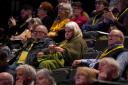 A delegate does some knitting at the SNP conference. Picture: Andrew Milligan