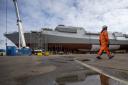 Workers on the new Type 26 frigate HMS Glasgow at BAE Systems' Govan shipyard