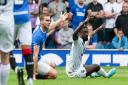 Ross County's Jordy Hiwula complains for a foul many thought worthy of a red card by Rangers' James Sands