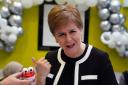 First Minister Nicola Sturgeon with comedy teeth during her visit to Buchanan Street Residential Children's Home in Coatbridge