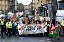 Demonstrators take part in the Fridays for Future Scotland march through Glasgow