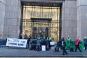 XR activists staged a protest outside of JP Morgan's Glasgow office
