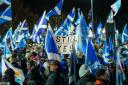 Scottish Independence supporters are seen at a demo outside Holyrood, the Scottish Parliament, on November 23, 2022 in Edinburgh, Scotland