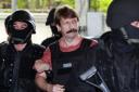 Arms smuggler Viktor Bout on his arrest in  Thailand in 2010. The Russian was freed  last week as part of a prisoner swap with  the US which saw detained basketball star Brittney Griner released by the Kremlin 
authorities