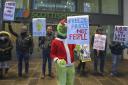 A demonstration against astronomical rises in energy bills was held outside Scottish Power HQ with protesters claiming energy giants were ruining Christmas