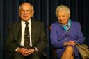 Milton Friedman, recipient of the 1976 Nobel Prize for economic science, sits with his wife Rose on May 9, 2002
