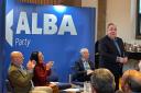 Alba leader Alex Salmond addresses people at the party's special assembly on independence