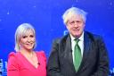 Nadine Dorries with Boris Johnson in the studio for her new TV show. Don't they both look thrilled