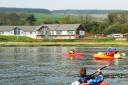 Kayakers will join a peaceful march from the water to the Arran Outdoor Education Centre