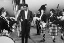 Muhammad Ali gets a traditional welcome as he steps down on Scottish soil