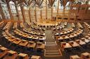 The report said that the UK Government was still 'adjusting' to the existence of the Scottish Parliament