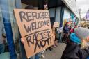 Anti-fascists counter-protesting far-right activists at a hotel housing asylum seekers