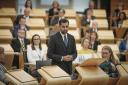 Humza Yousaf speaking in the main chamber at the Scottish Parliament in Edinburgh.