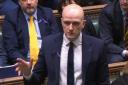 MPs could be seen wearing purple ribbons at PMQs