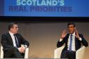 Douglas Ross speaks to Rishi Sunak at the Tory conference in Glasgow