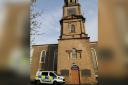 Police at Irvine Old Parish Church after historic human remains were found inside