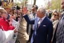King Charles greets well-wishers outside Buckingham Palace ahead of the coronation