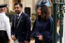 First Minister of Scotland Humza Yousaf and his wife Nadia El-Nakla arriving at Westminster Abbey