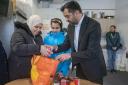 First Minister Humza Yousaf helps out at the Whitfield Community Larder in Dundee