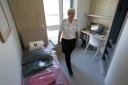 A prison officer inside a room within Iris House at HMP Stirling, Scotland's new women's prison