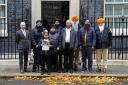 Members of the Free Jaggi Now Campaign hand in a petition to 10 Downing Street