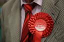 Generic photograph of a Labour candidate's red rosette