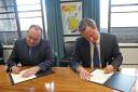 Alex Salmond and David Cameron signing the Edinburgh Agreement in 2012