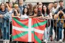 Fans wave the flag of the Basque Country during the Tour de France
