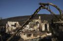 A burnt house stands near Gennadi village, on the Aegean Sea island of Rhodes, Greece